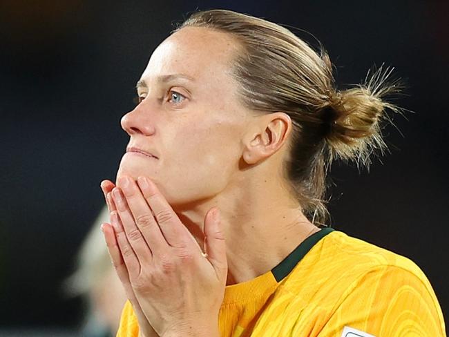 SYDNEY, AUSTRALIA - AUGUST 16: Emily Van-Egmond and Sam Kerr of Australia applaud fans after the team's 1-3 defeat and elimination from the tournament following the FIFA Women's World Cup Australia & New Zealand 2023 Semi Final match between Australia and England at Stadium Australia on August 16, 2023 in Sydney, Australia. (Photo by Catherine Ivill/Getty Images)