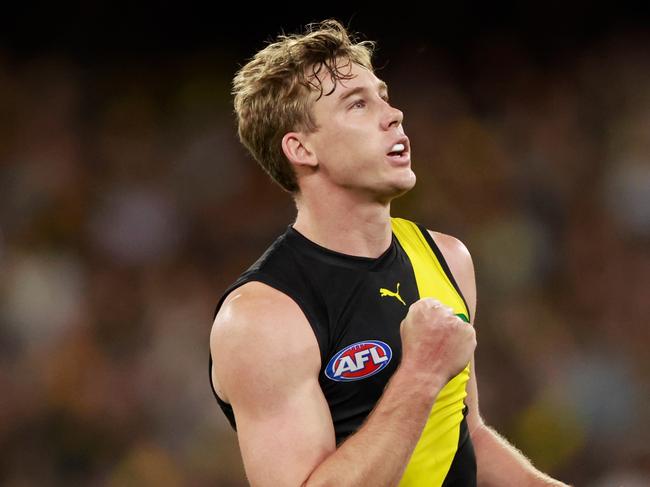 MELBOURNE, AUSTRALIA - MARCH 16: Tom Lynch of the Tigers celebrates a goal during the 2023 AFL Round 01 match between the Richmond Tigers and the Carlton Blues at the Melbourne Cricket Ground on March 16, 2023 in Melbourne, Australia. (Photo by Dylan Burns/AFL Photos via Getty Images)