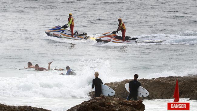 Surfers at Snapper Rocks Wednesday, the day after a fatal shark attack at Greenmount. Photo: Scott Powick.