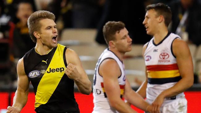 Dan Butler of the Tigers celebrates a goal against the Crows at the MCG on Friday night. Picture: Getty Images