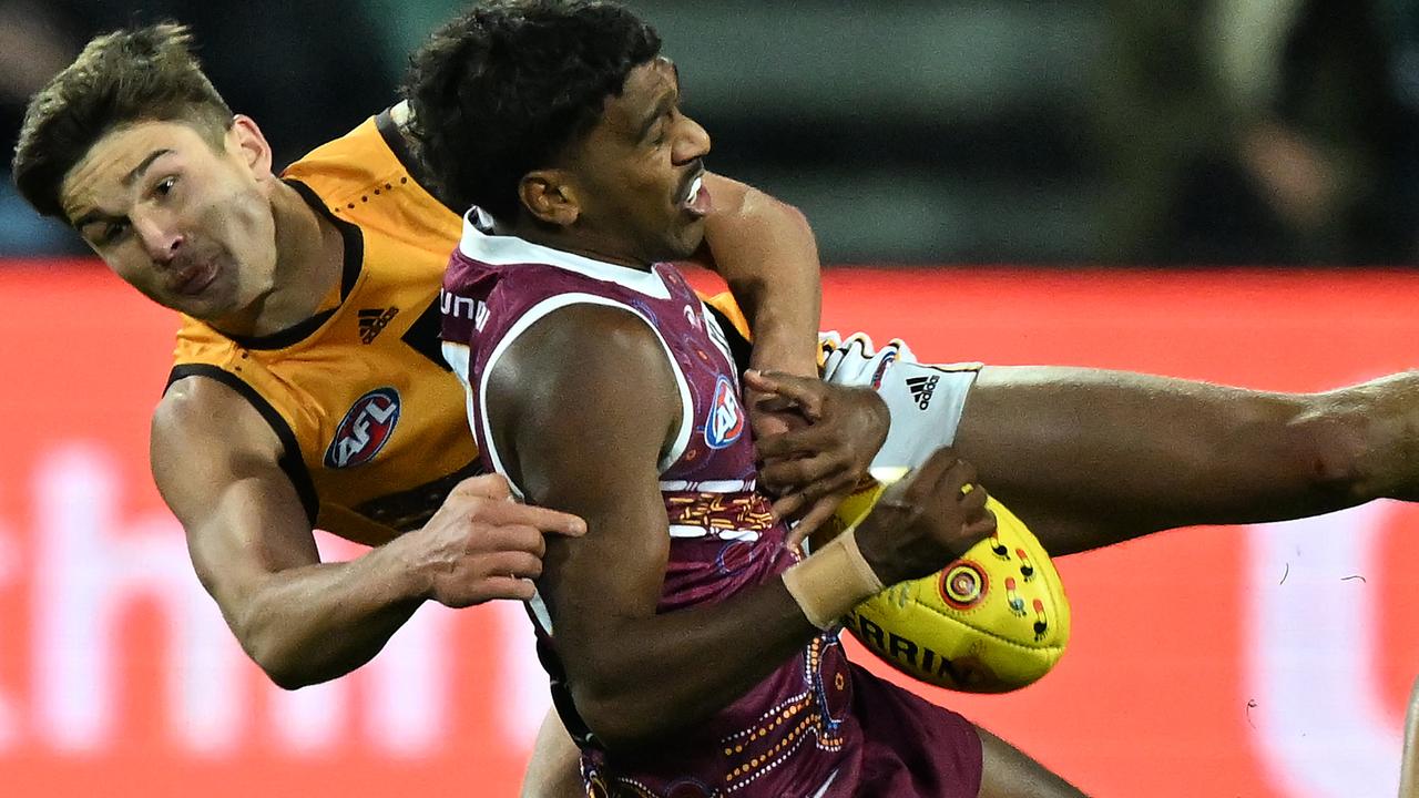 Keidean Coleman of the Lions is tackled. Photo by Steve Bell/Getty Images