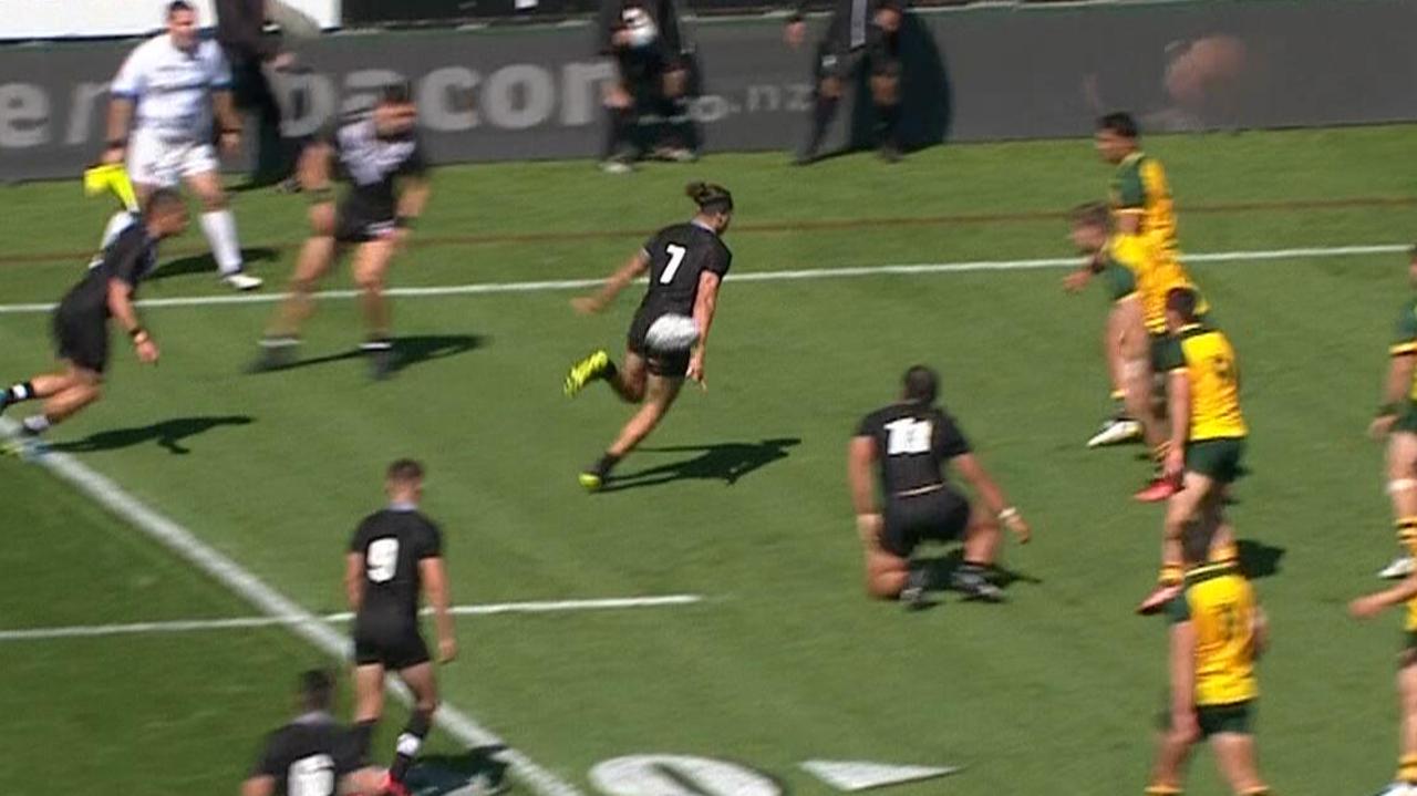 Chanel Harris-Tavita does a scorpion kick to set up a try.