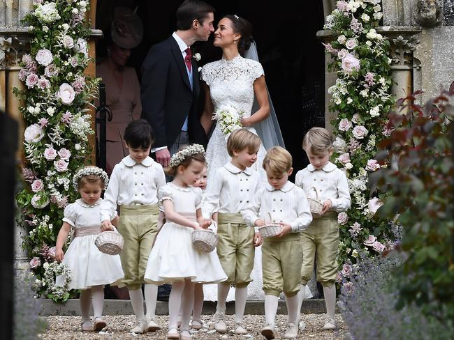 Pippa Middleton kisses her new husband James Matthews following their wedding ceremony at St Mark's Church. Picture: Justin Tallis — WPA Pool