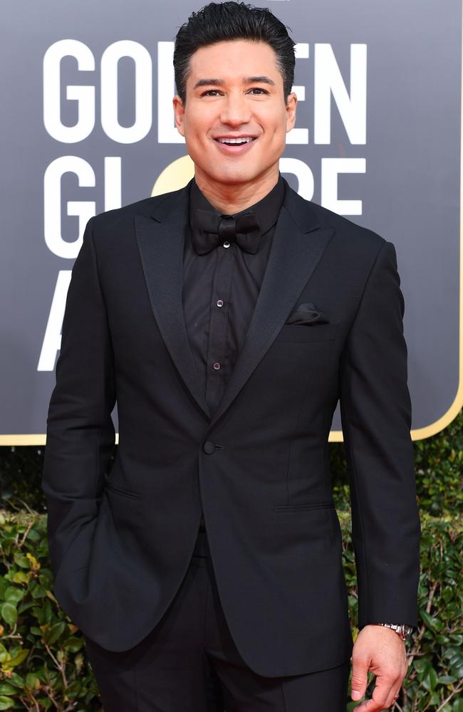 The former Saved By The Bell star looked dapper in a black suit. Photo: Valerie Macon/ AFP)