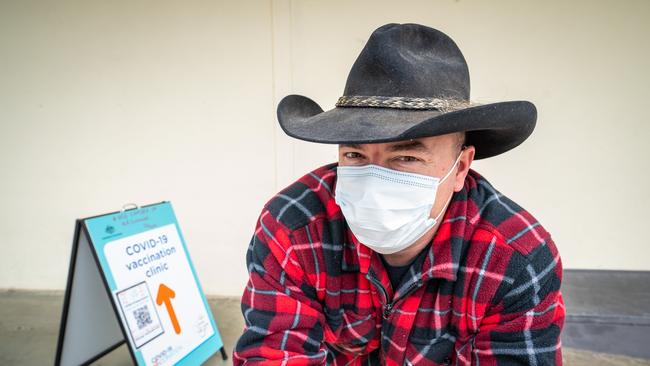 Brendon Newley from Wodonga lining up to get the jab at the Wodonga vaccination hub. Picture: NCA NewsWire / Simon Dallinger