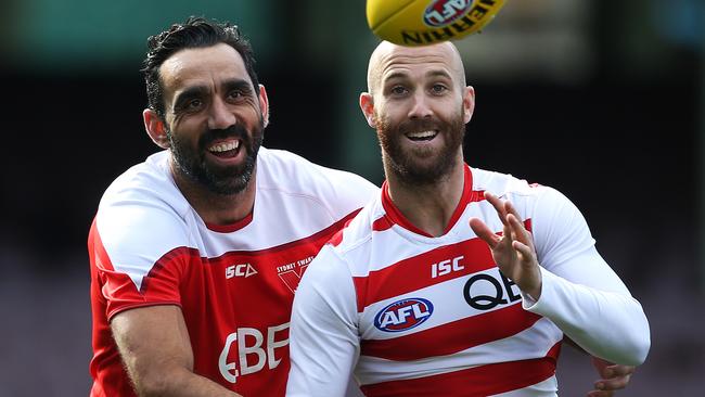 Close mates Adam Goodes and Jarrad McVeigh share a laugh at Swans training. Picture: Phil Hillyard