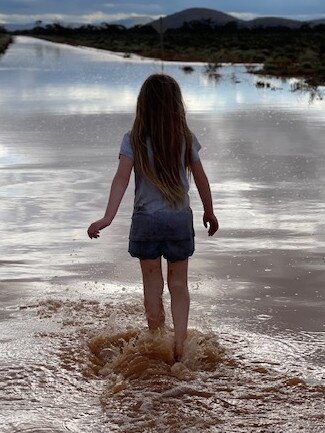 A girl in the water in the Gawler Ranges. Picture: Katrina Morris