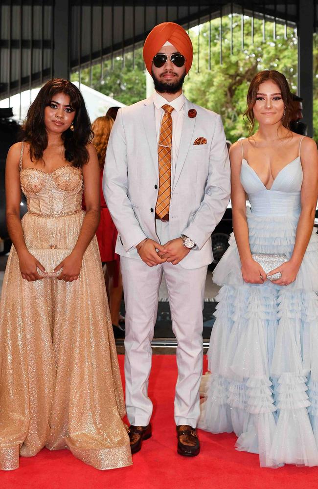 Allara, Angad and Georgia at Caloundra State High School formal. Picture: Patrick Woods.