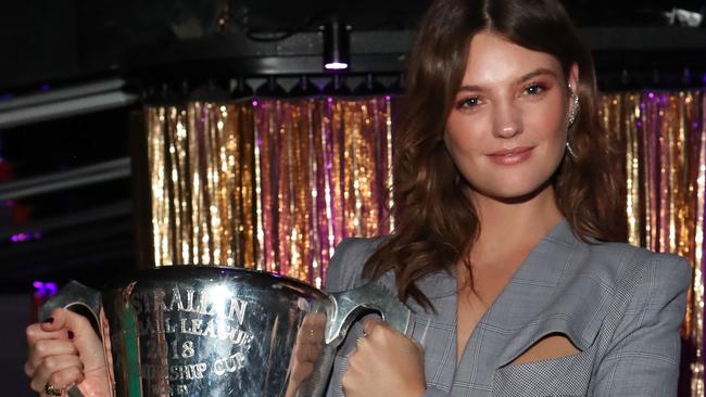 Montana Cox with the Premiership Cup at the Virgin Grand Final party. Picture: Lucas Dawson