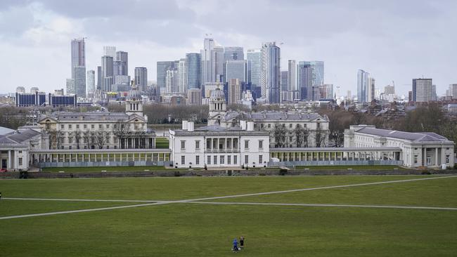 A couple work out in a quiet Greenwich Park. Picture: AP.