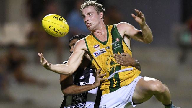 Nichols Medal favourite Dylan Landt flies for a chest mark against Palmerston. Picture: Felicity Elliott AFLNT/Media