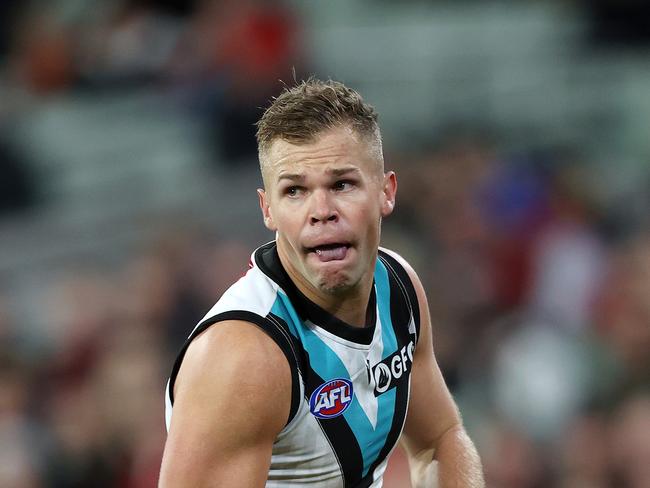 MELBOURNE, JULY 1, 2023: AFL Football Round 16 – Essendon V Port Adelaide at the MCG. Dan Houston of the Power in action. Picture: Mark Stewart