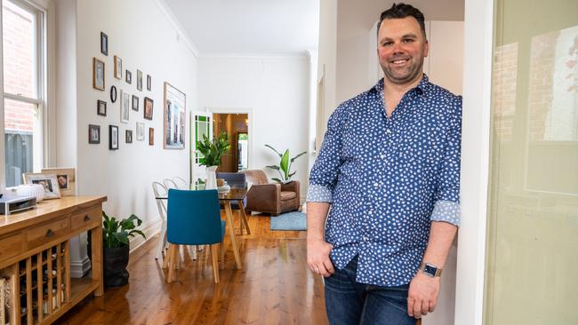 Cain Cooke, interim chief executive of the Real Estate Institute of South Australia, relaxing at his home. Photo: Nick Clayton