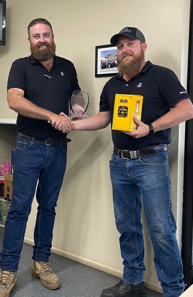 Lain Martin with his boss, Kris Pidgeon, in November when they celebrated his 15 years of service.