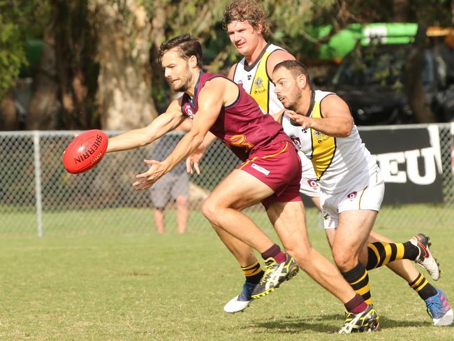 Callum McBurnie, left) was knocked out while playing against Western Magpies. Pictured here playing against Labrador. Picture: Mike Batterham.