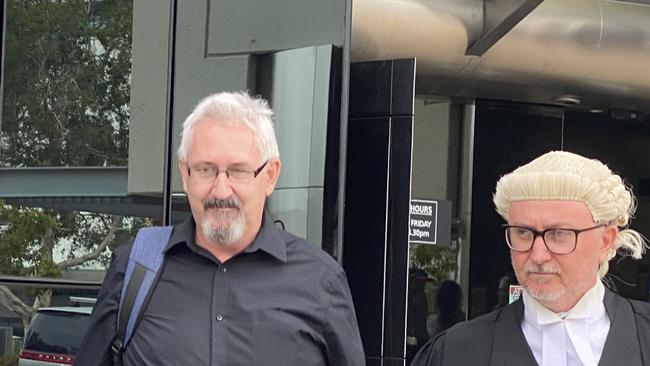 Myles Andrew Lyster (left) leaving Southport Courthouse with barrister Jason Buckland. Picture: Lea Emery