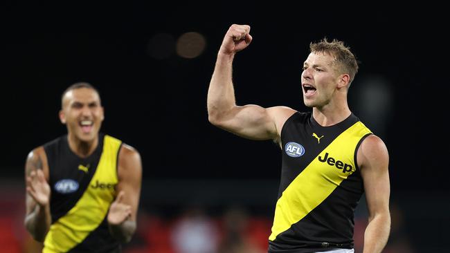 Jake Aarts is exultant after booting a goal for the Tigers. Picture: Michael Klein