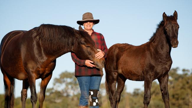 Eva Hornung with her charges on her farm in the Adelaide Hills. Picture: Matt Turner