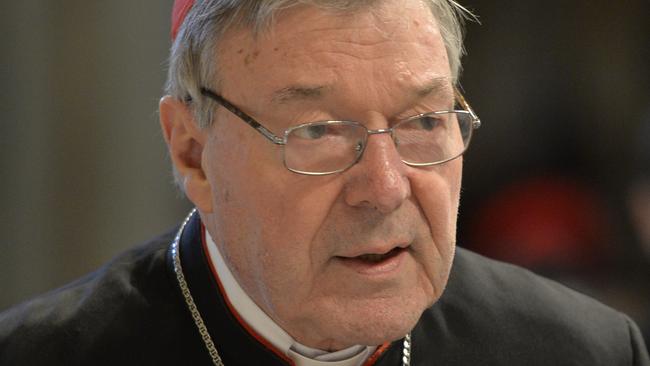 Australian Cardinal George Pell, Prefect of the Secretariat for the Economy of the Holy See arrives to attend a Chrism mass for Holy Thursday (Maundy Thursday) which marks the start of Easter celebrations on April 2, 2015 at St Peter's basilica in Vatican. AFP PHOTO / ANDREAS SOLARO