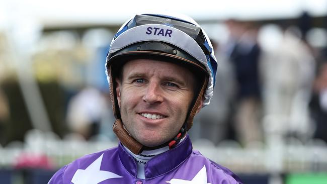 SYDNEY, AUSTRALIA - OCTOBER 12:  Tommy Berry riding Olentia wins Race 9 The Nivison during Sydney Racing at Rosehill Gardens on October 12, 2024 in Sydney, Australia. (Photo by Jeremy Ng/Getty Images)