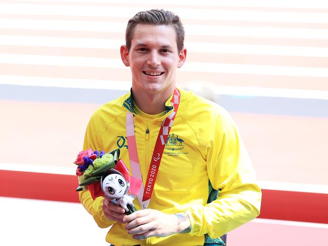 McCracken with his Tokyo Paralympic silver medal in the T34 men’s 100m. Picture: Getty Images