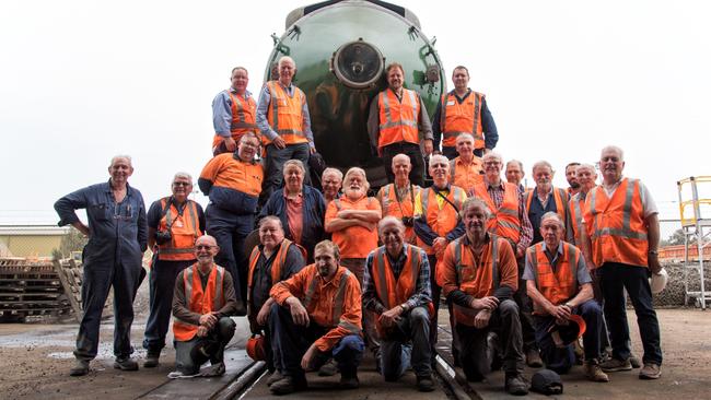 Transport Heritage NSW volunteers who restored the 3801 steam train. Supplied: Transport Heritage NSW