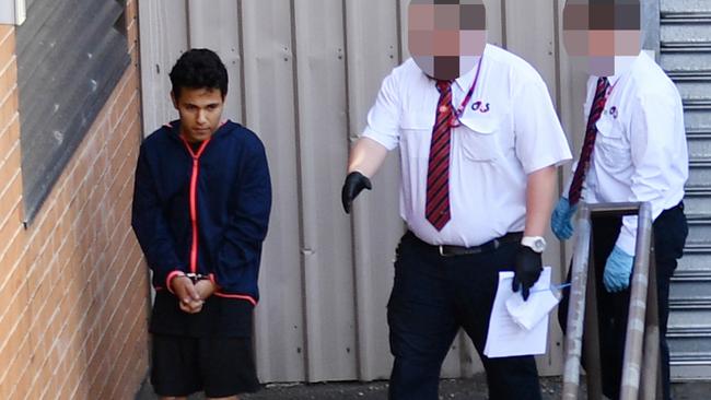 Numan Mohammed is seen outside the Magistrates Court cells last year. (AAP Image/David Mariuz)