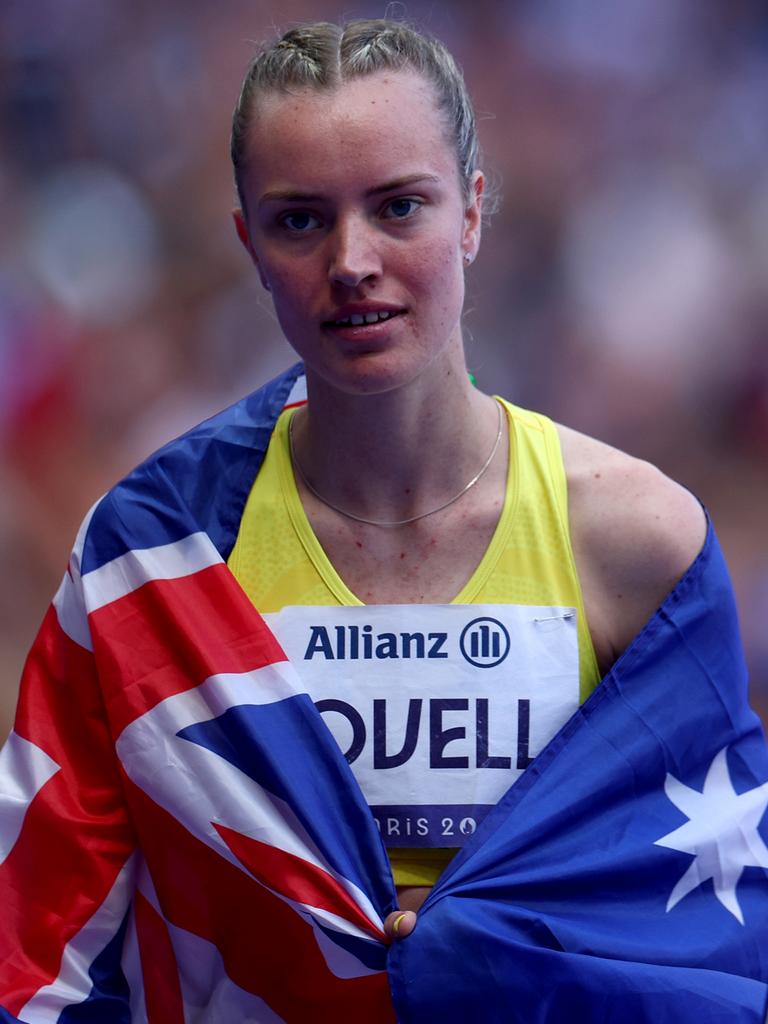 Bronze medallist Mali Lovell wrapped herself in the Australian flag after the final. Picture: Dean Mouhtaropoulos/Getty Images