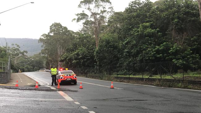 Emergency services have been called to Mount Kembla after a car crashed into a power pole, catching alight. A person has died. Picture: Madeline Crittenden