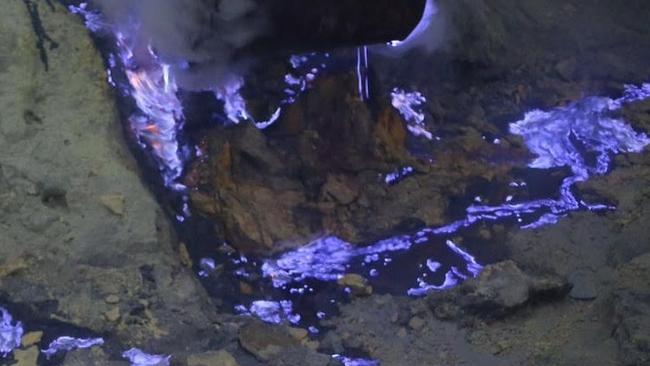 Blue flames from sulphur at Kwata Ijen volcano in Banyuwangi.