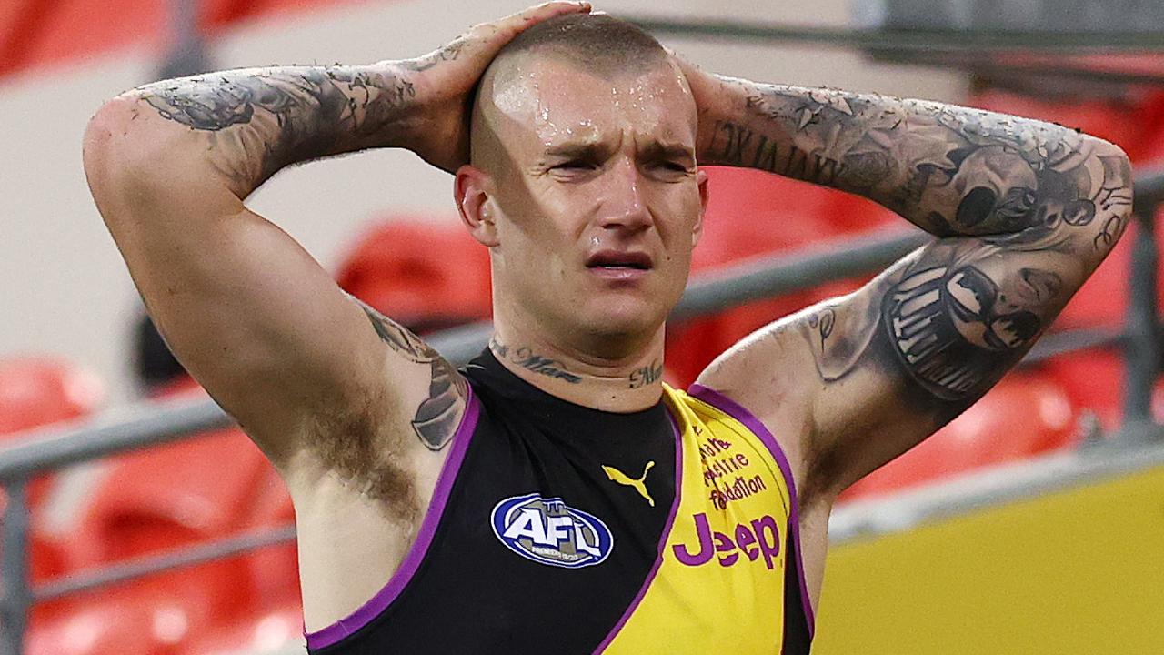 Richmond’s Dustin Martin after getting injured in a collision with Mitch Robinson. Picture: Michael Klein