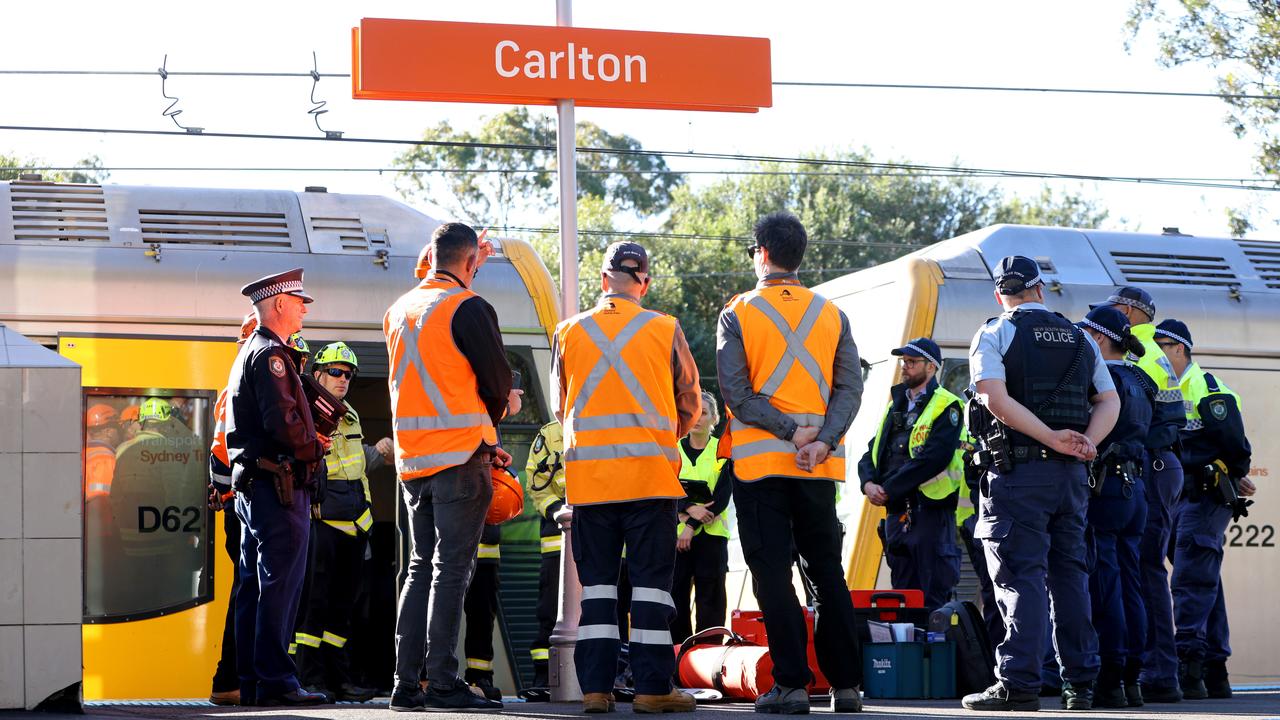 Emergency services at Carlton train station where a man and his daughter have died. Picture: Damian Shaw