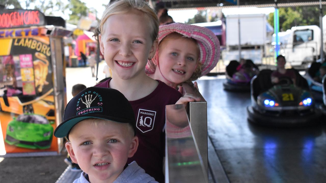 Ruby Lacey, Kaylee Symonds, and Lincoln Lacey of Bowen getting ready for their go on the dodgem cars. Picture: Kirra Grimes