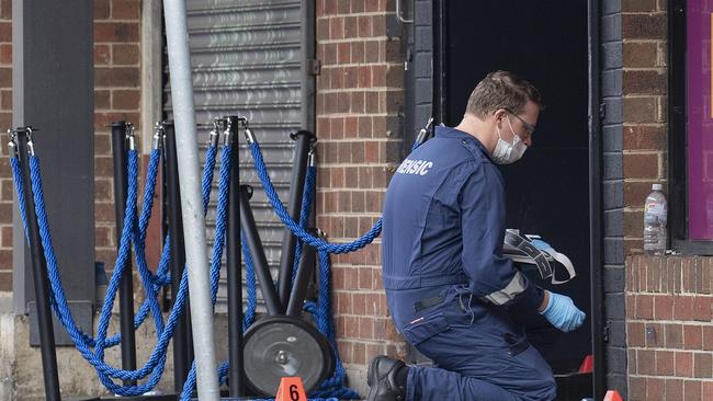 Victoria Police at the scene of the shooting outside Love Machine nightclub in April.