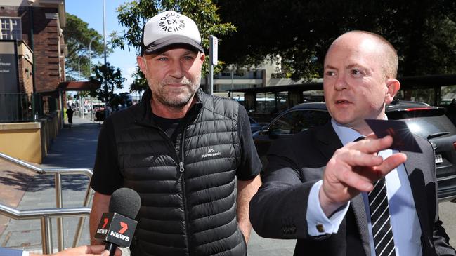 Michael Slater and his solicitor James McLoughlin pictured leaving Manly Police Station on a previous occasion. Picture: Richard Dobson