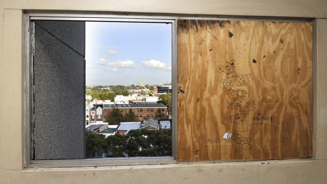 Boarded up windows at Suicide Towers.