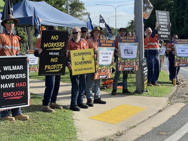 The striking workers, stationed outside the Plane Creek mill along the Bruce Highway, were unable to speak out alone for fear of repercussions from Wilmar. Photo: Fergus Gregg