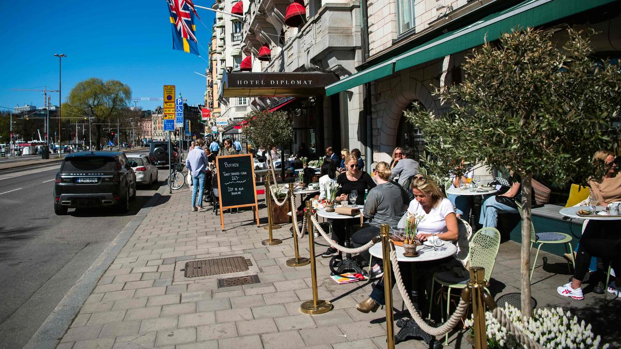 People have lunch at a restaurant in Stockholm during the coronavirus pandemic. Picture: AFP