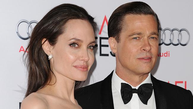 HOLLYWOOD, CA - NOVEMBER 05:  Angelina Jolie and Brad Pitt attend the premiere of "By the Sea" at the 2015 AFI Fest at TCL Chinese 6 Theatres on November 5, 2015 in Hollywood, California.  (Photo by Jason LaVeris/FilmMagic)