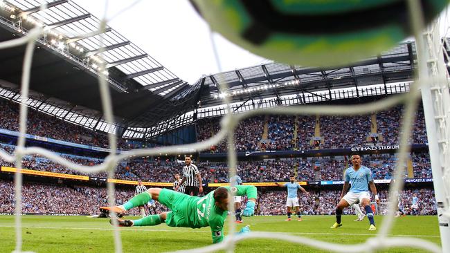 Newcastle goalkeeper Martin Dubravka can’t stop the shot of Manchester City defender Kyle Walker. Photo: Getty Images