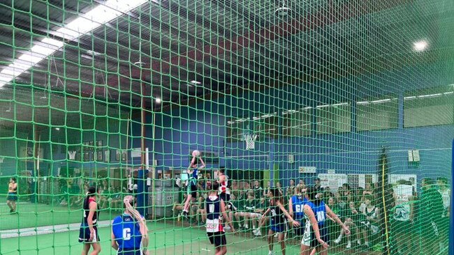 Matt Gibbs playing indoor netball.