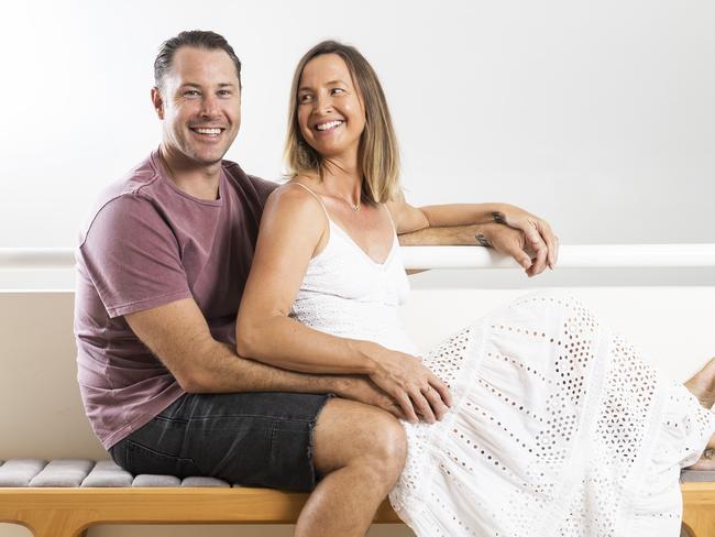 Brooke Hanson with her husband Jared at home on the Gold Coast. Picture: Nigel Hallett