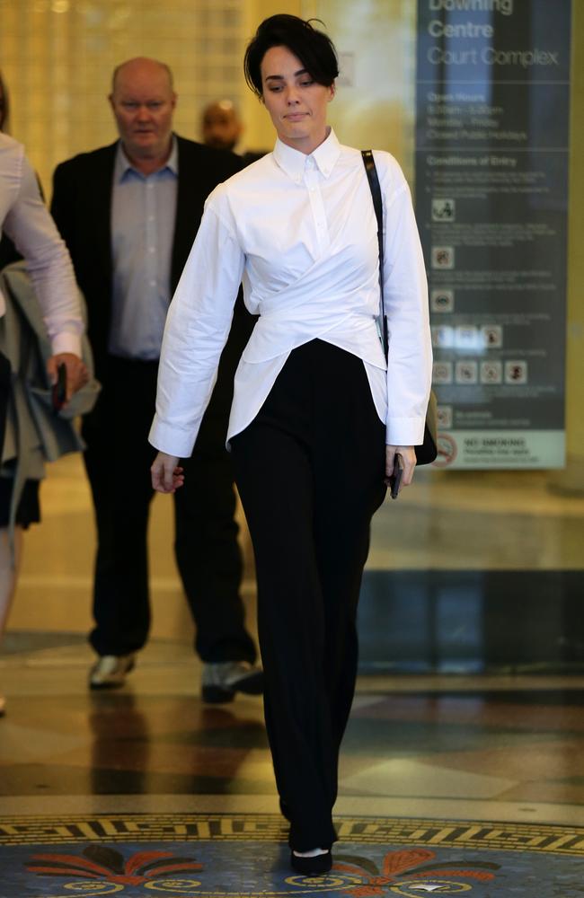 Sarah Budge and her designer outfits took centre stage at Downing Centre courts. Picture: Jonathan Ng