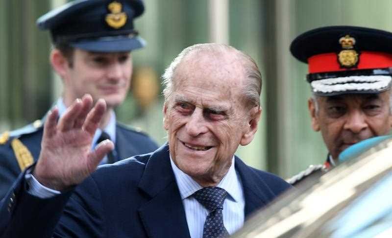 Britain's Prince Philip, the Duke of Edinburgh waves to well-wishers after he and Britain's Queen Elizabeth II (unseen) officially opened the new Cyber Crime Security centre in London, Britain, 14 February 2017. 