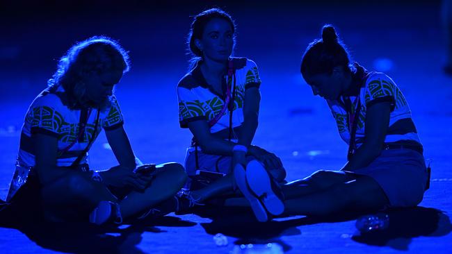 Athletes are seen sitting down during the closing ceremony of the XXI Commonwealth Games on the Gold Coast. Picture: AAP