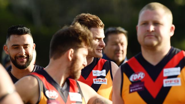 Heath Shaw and his East Keilor teammates after their victory. Picture: Steve Tanner