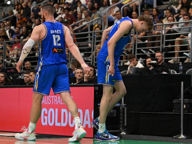 Rocco Zikarsky (R) of the Bullets leaves the court after sustaining an injury. Picture: Matt Roberts/Getty Images for NBL