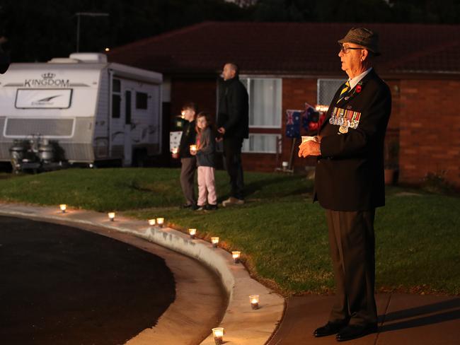 Veteran Peter McFarlane was joined by his Ingleburn neighbours last year, who lined the street with candles ensuring he didn’t mark the day alone. Picture: David Swift.