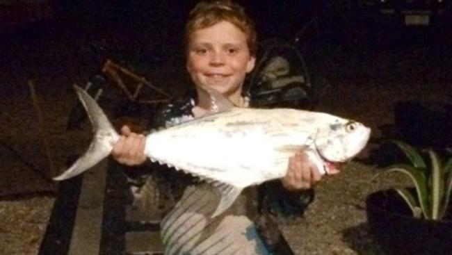 Mitchell Murphy with the nice queenfish he caught off the Mandorah jetty.