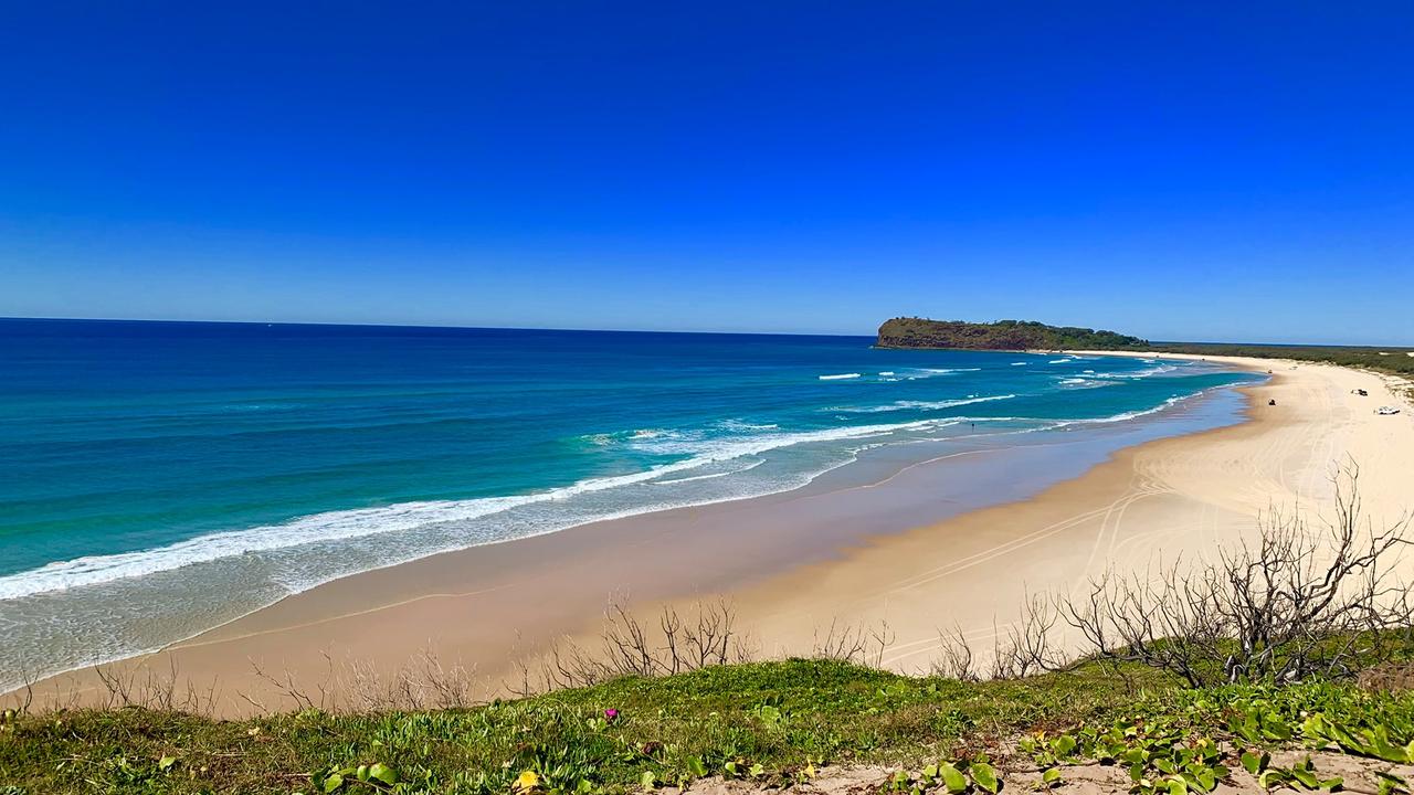 The woman was saved by two men driving past on the beach. Picture: Facebook